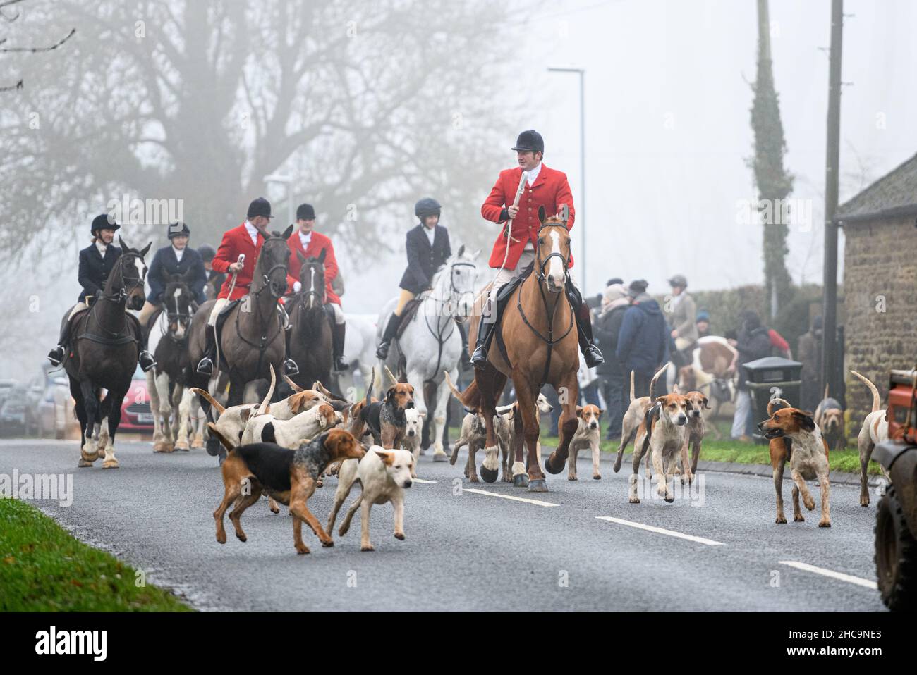 Huntsman Chris Edwards leads The Cottesmore Hunt Boxing Day Meet at Barleythorpe, Sunday 26 December 2021 © 2021 Nico Morgan. All Rights Reserved Stock Photo