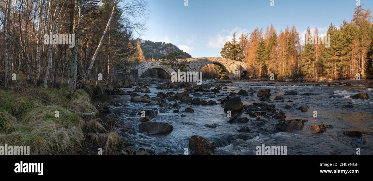 A Panoramic View of the Old Bridge of Dee at Invercauld, near Braemar, in the Scottish Highlands on a Sunny Morning in Winter Stock Photo
