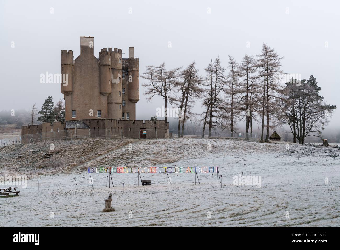 The Piece of Contemporary Neon Art at Braemar Castle Provides an Uplifting, Multicoloured Message of Hope in Contrast to the Austere, Wintery Setting Stock Photo