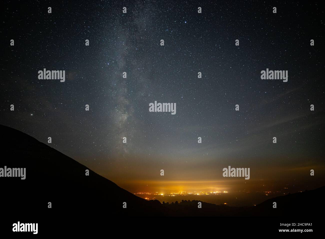 Milky way over Ruthin in the Vale of Clwyd, North Wales Stock Photo