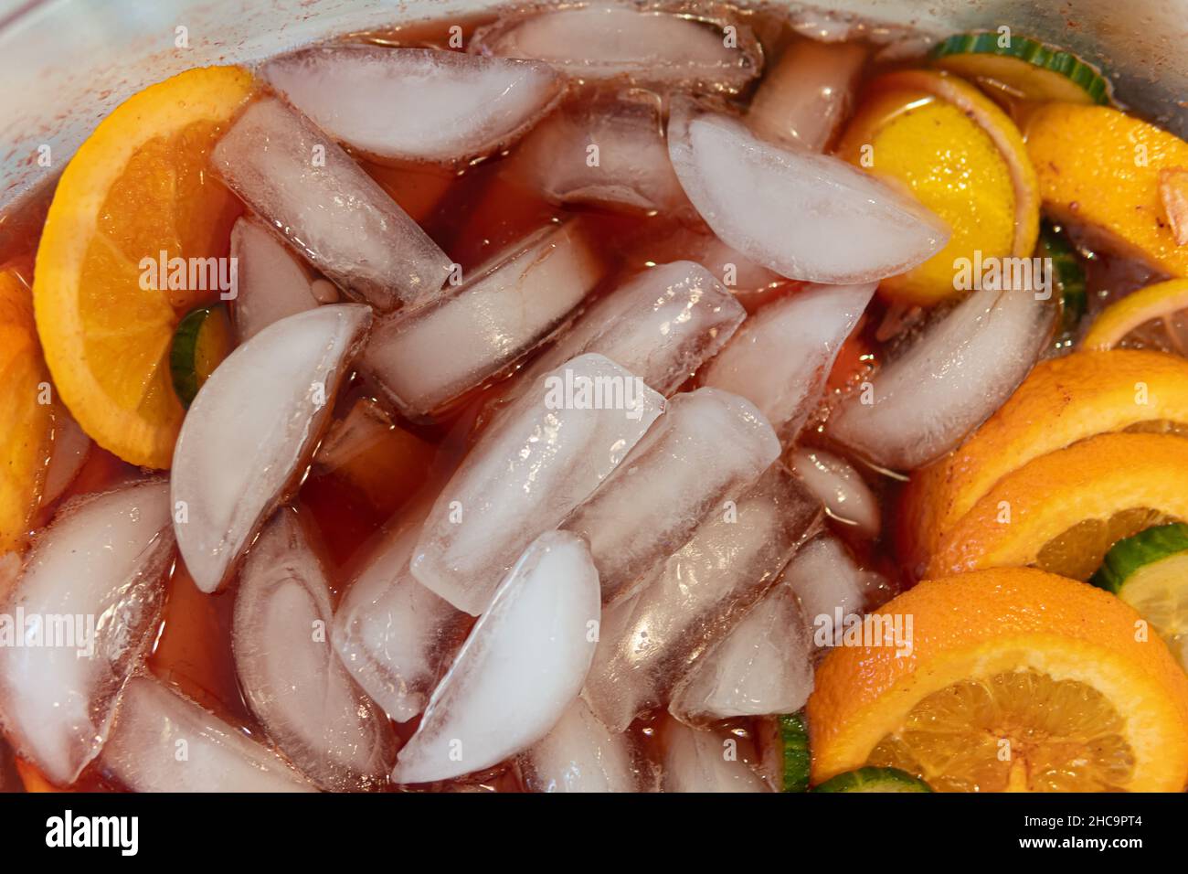fruit punch in a drink dispenser at a party Stock Photo - Alamy