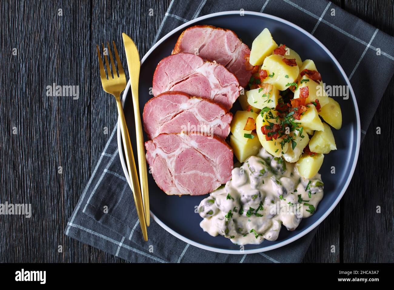 Judd mat gaardebounen, Smoked Collar of Pork with blanched Broad Beans  cooked with creamy sauce and boiled potatoes on a plate, national dish of  Luxem Stock Photo - Alamy