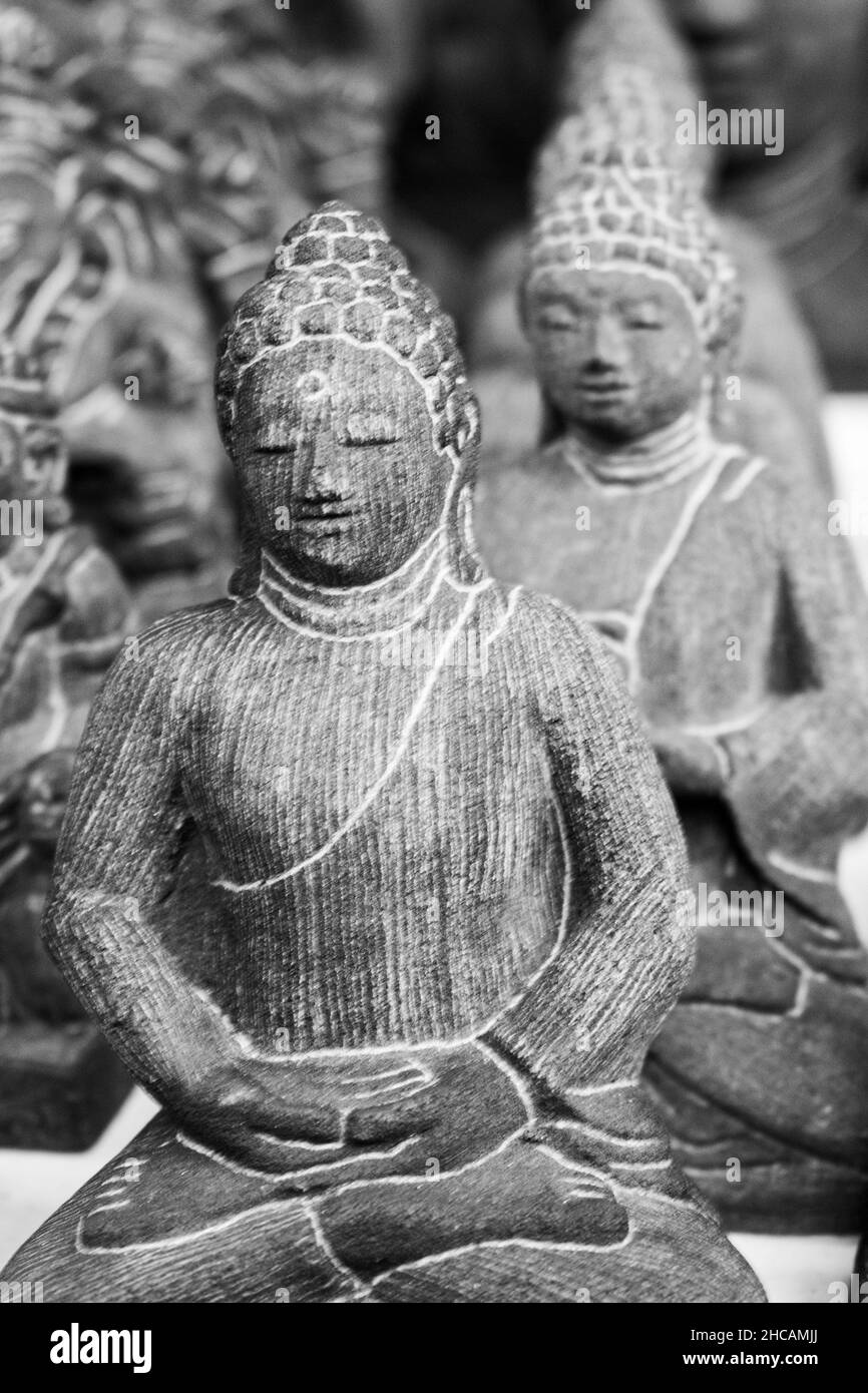Miniature Buddha statue in black and white Stock Photo Alamy