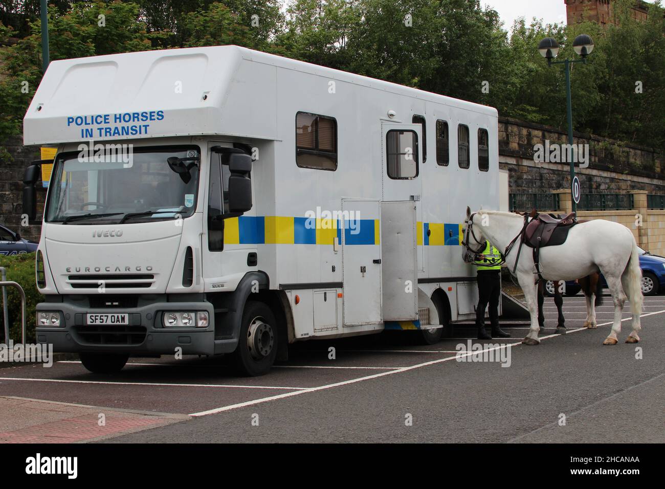 SF57 OAW, an Iveco EuroCargo lorry operated by Police Scotland in the horse transportation role, at Greenock in Inverclyde, Scotland (with horses). Stock Photo