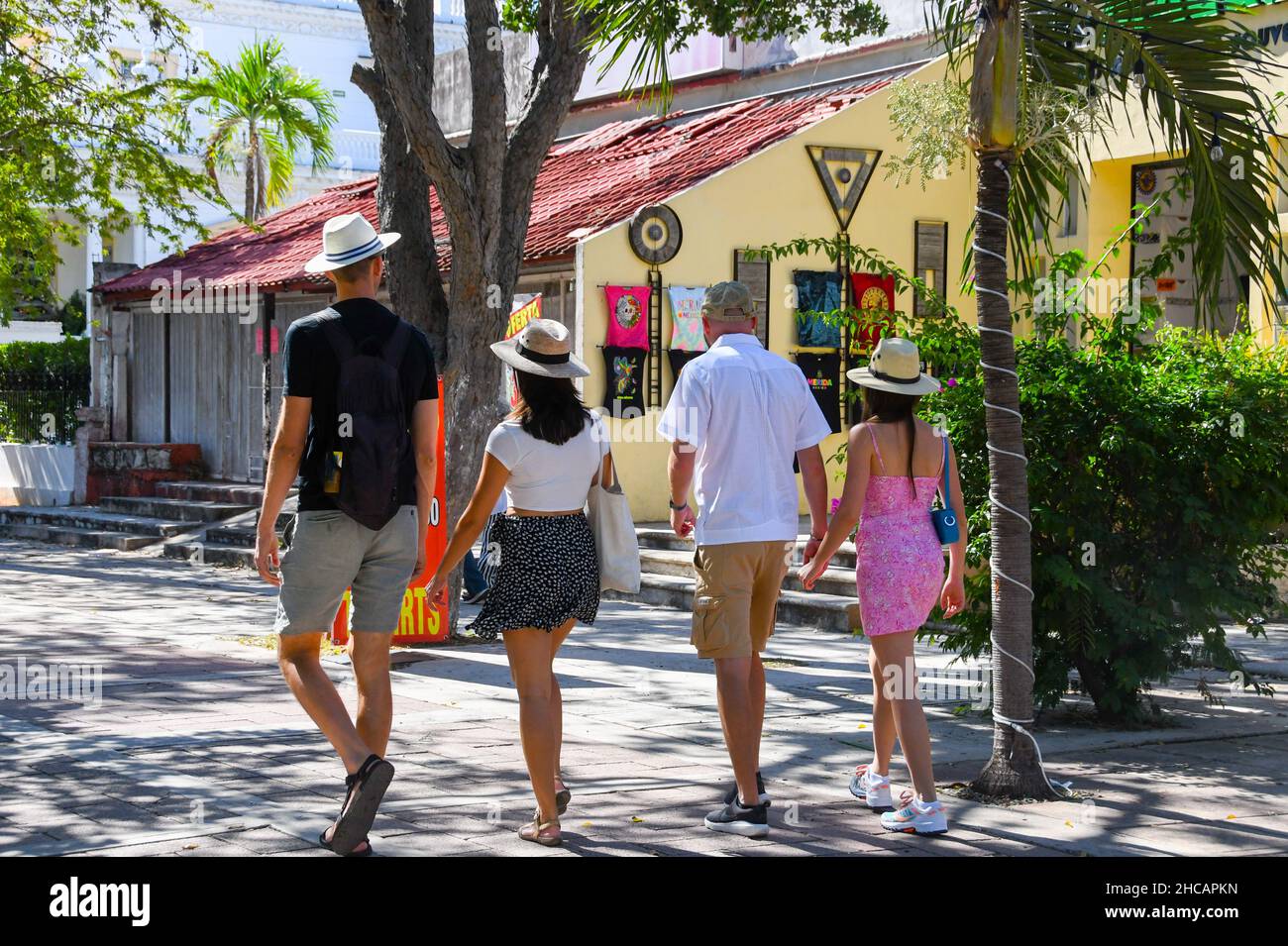 Tourists walking, Paseo de Montejo, Merida Mexico Stock Photo