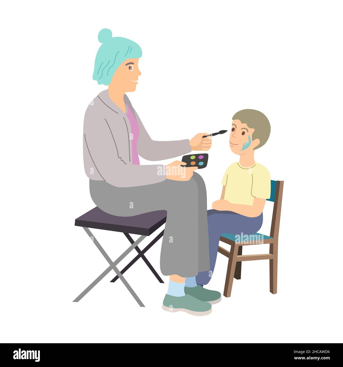 Young woman make face painting for little preschool boy. Face painting