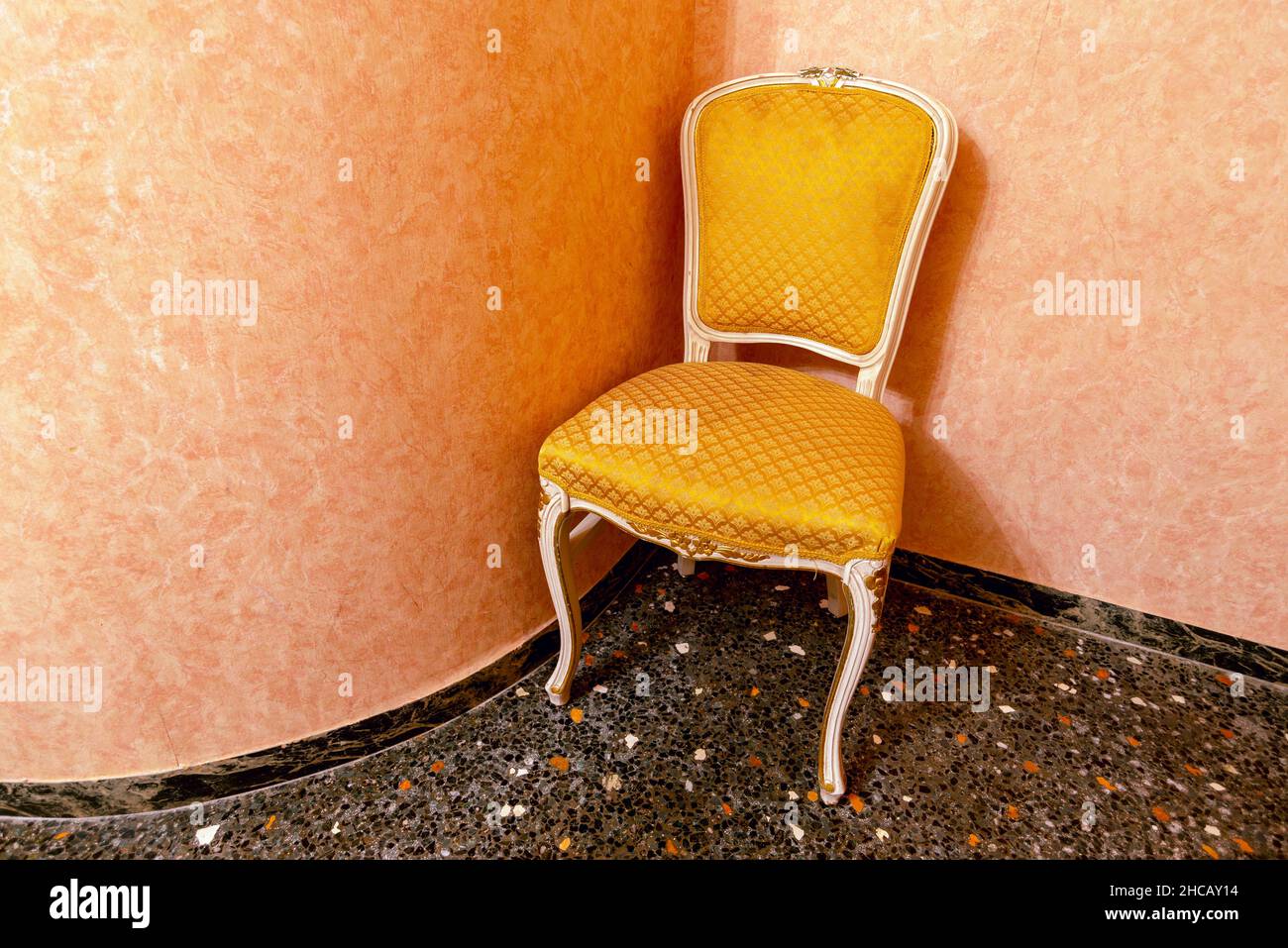 vintage classic chair with curved legs in room corner Stock Photo Alamy