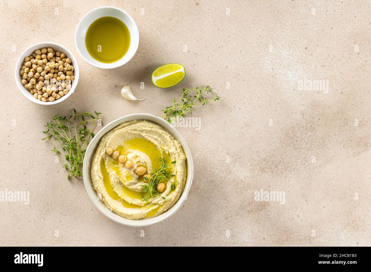 Healthy homemade hummus, made with tahini. Flat lay, copy space for