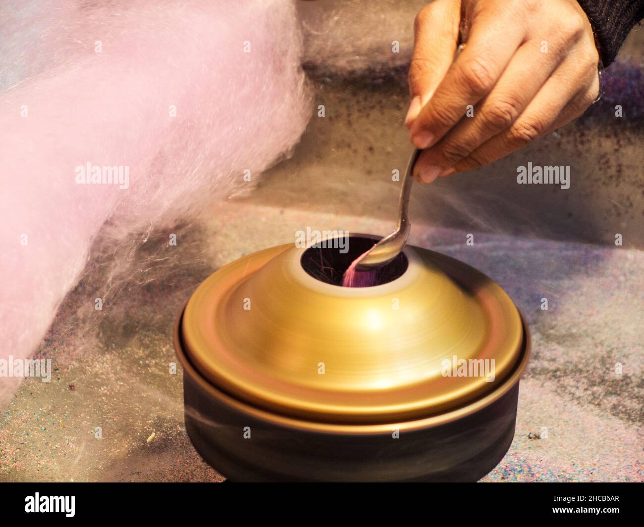 Man doing cotton candy Stock Photo