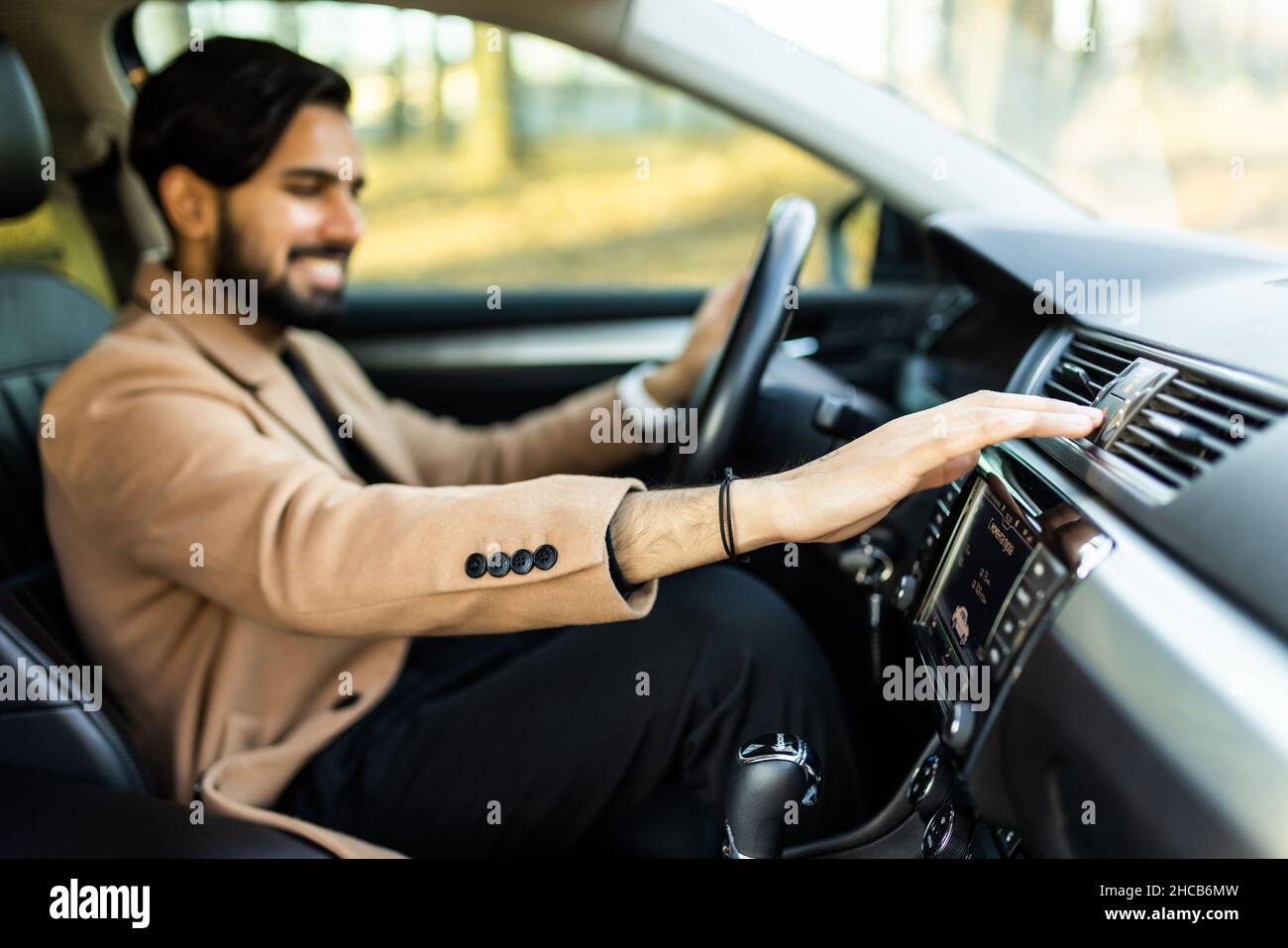 Man Using Gps Navigation System In Car to travel Stock Photo