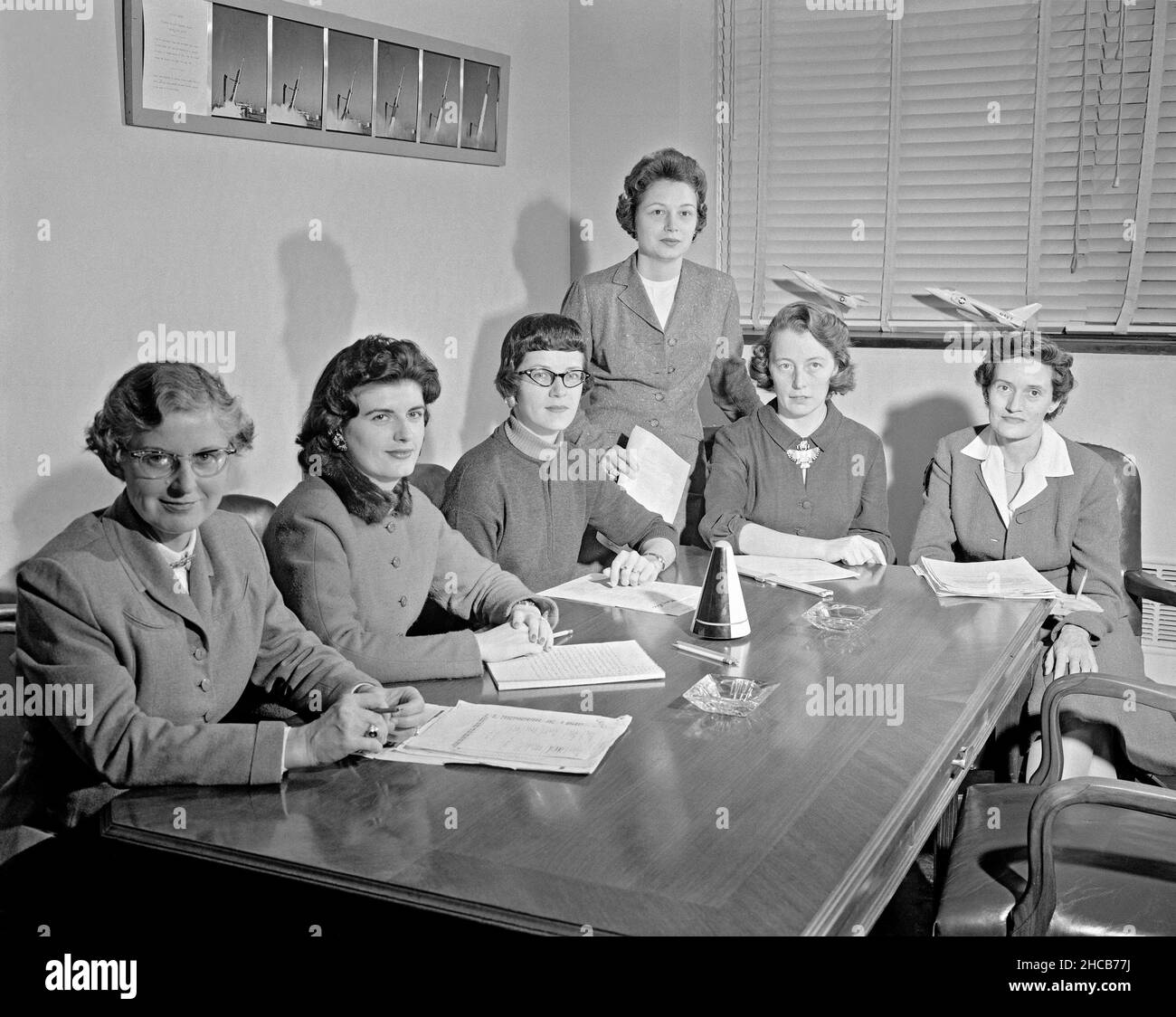 Women Scientists: Lucille Coltrane, Jean Clark Keating, Katherine Cullie Speegle, Doris 'Dot' Lee, Ruth Whitman, and Emily Stephens Mueller,Lucille Coltrane is at the far left. She was a computer and worked for Norm Crabill who provided positive identification. Lucille authored a NACA Research Memorandum, Investigation of Two Bluff Shapes in Axial Free Flight Over a Mach Number Range From 0.35 to 2.15 in 1958.  Next to Lucille is Jean Clark Keating. Jean was identified by Mary Woerner who said that both Jean and her husband Jerry are now deceased.  The third woman from the left is Katherine Cu Stock Photo