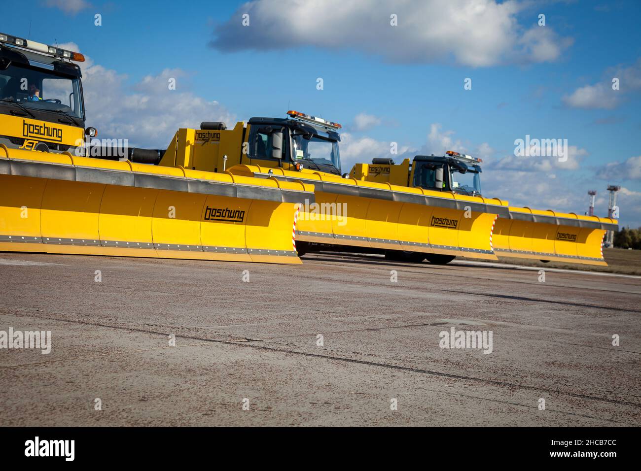 Kyiv, Ukraine - October 29, 2019: BOSCHUNG JETBROOM 9600 snow removal. Multifunctional dump truck cleaning system for airports and highways. Utility machinery -a truck with a large blade and a bucket Stock Photo