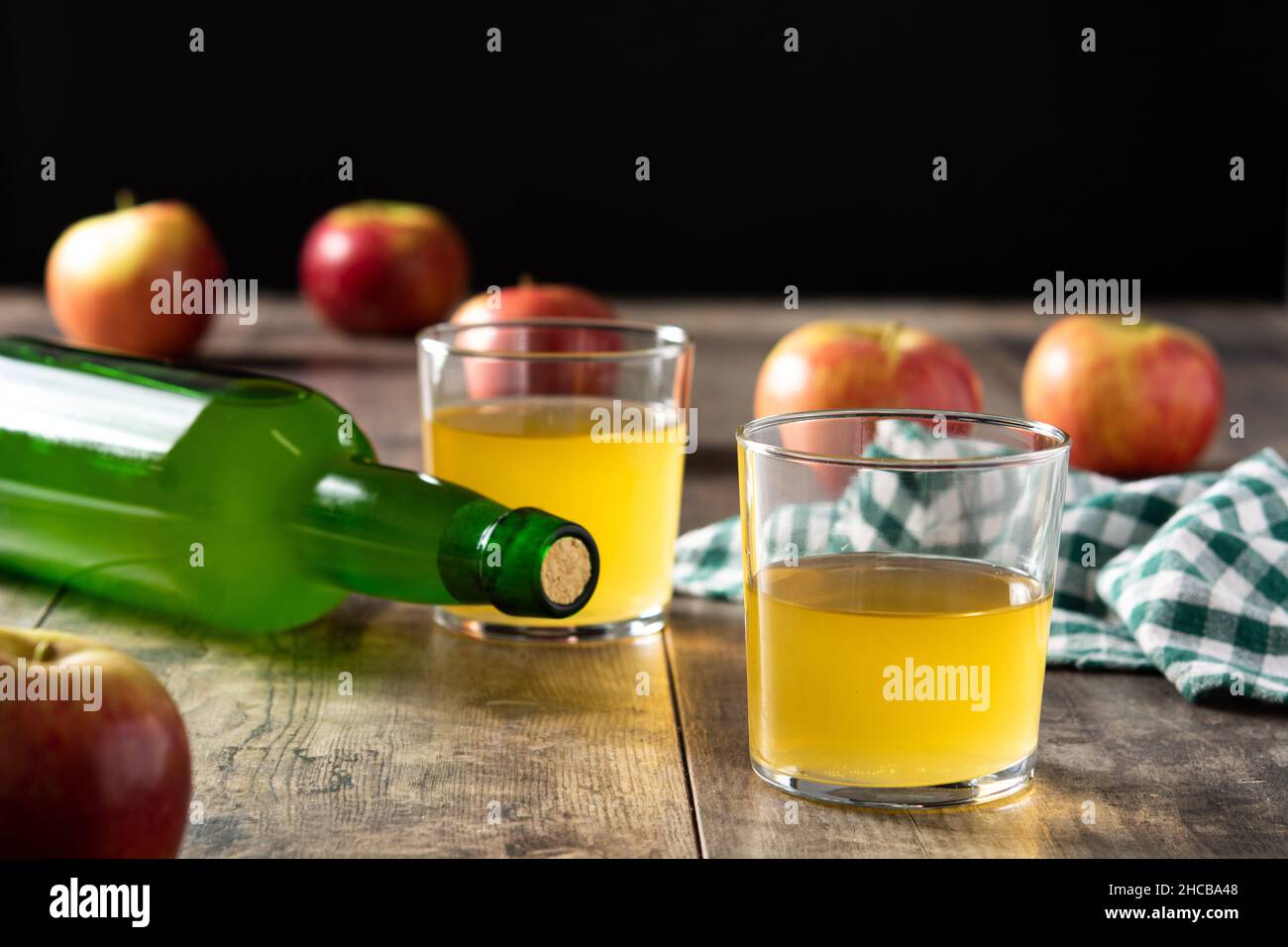 Apple cider drink on rustic wooden table Stock Photo