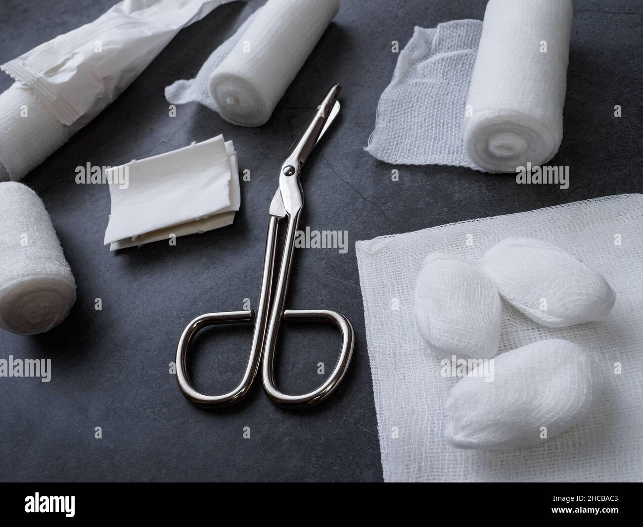 Medical bandages with scissors and sticking plaster. Medical equipment