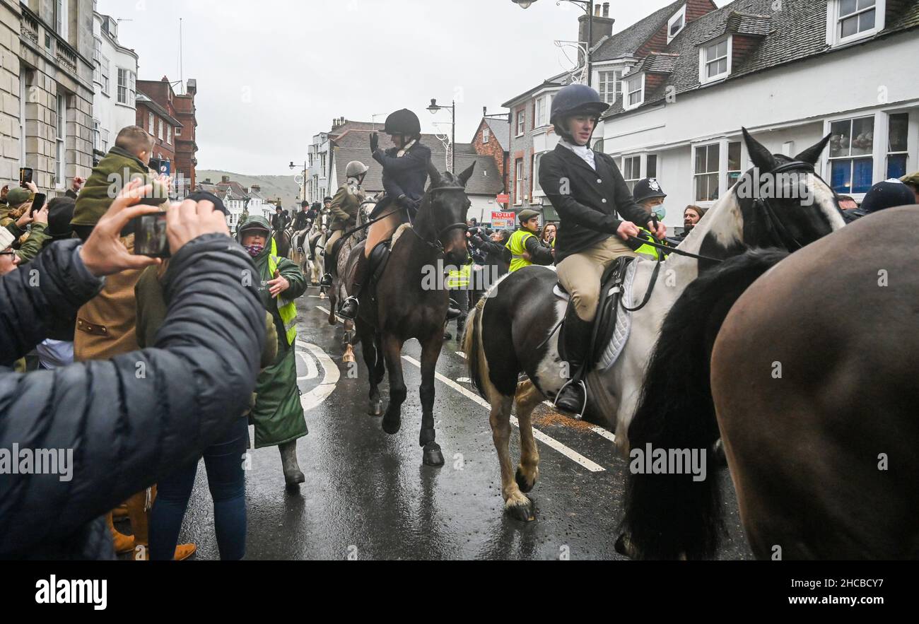 Lewes UK 27th December 2021 - The Southdown and Eridge Hunt parades through Lewes town centre on the Boxing Day bank holiday in the UK : Credit Simon Dack / Alamy Live News Stock Photo