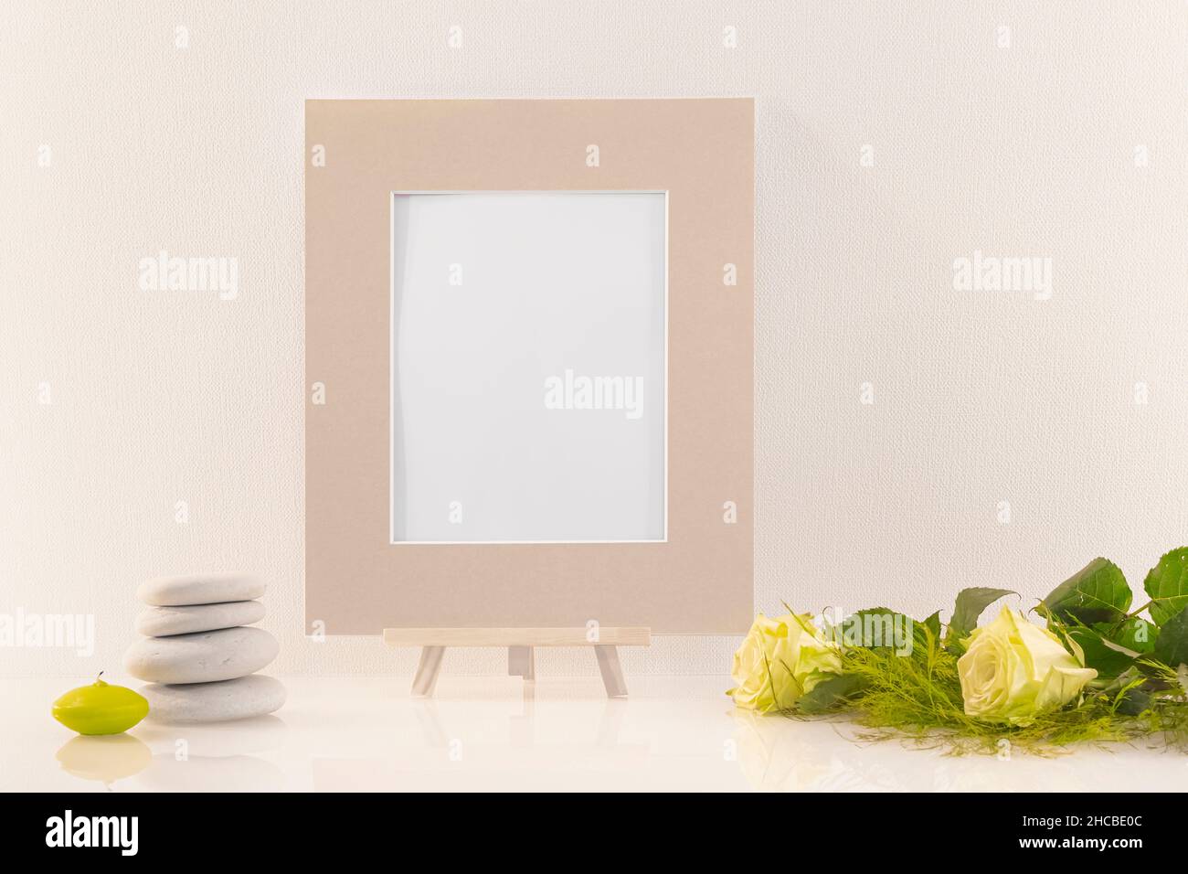 Empty photo frame to write a message, invitation, wishes, photography. Stock Photo