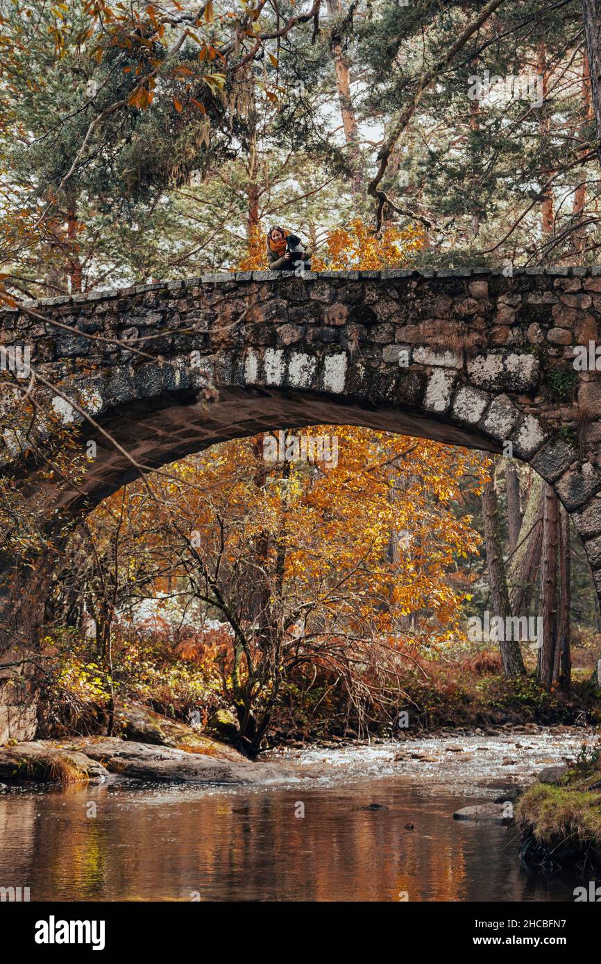 Woman and old bridge hi-res stock photography and images - Alamy
