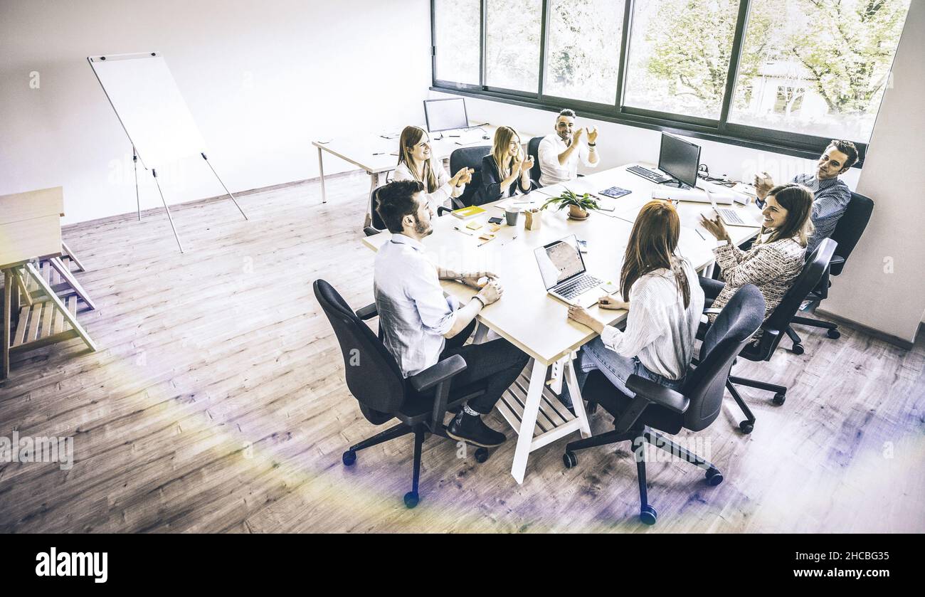 Young people employee coworkers at business meeting in urban coworking place studio - Human resources concept at working time - Start up entrepreneurs Stock Photo