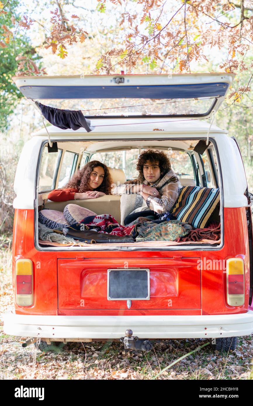 Couple spending weekend in campervan Stock Photo