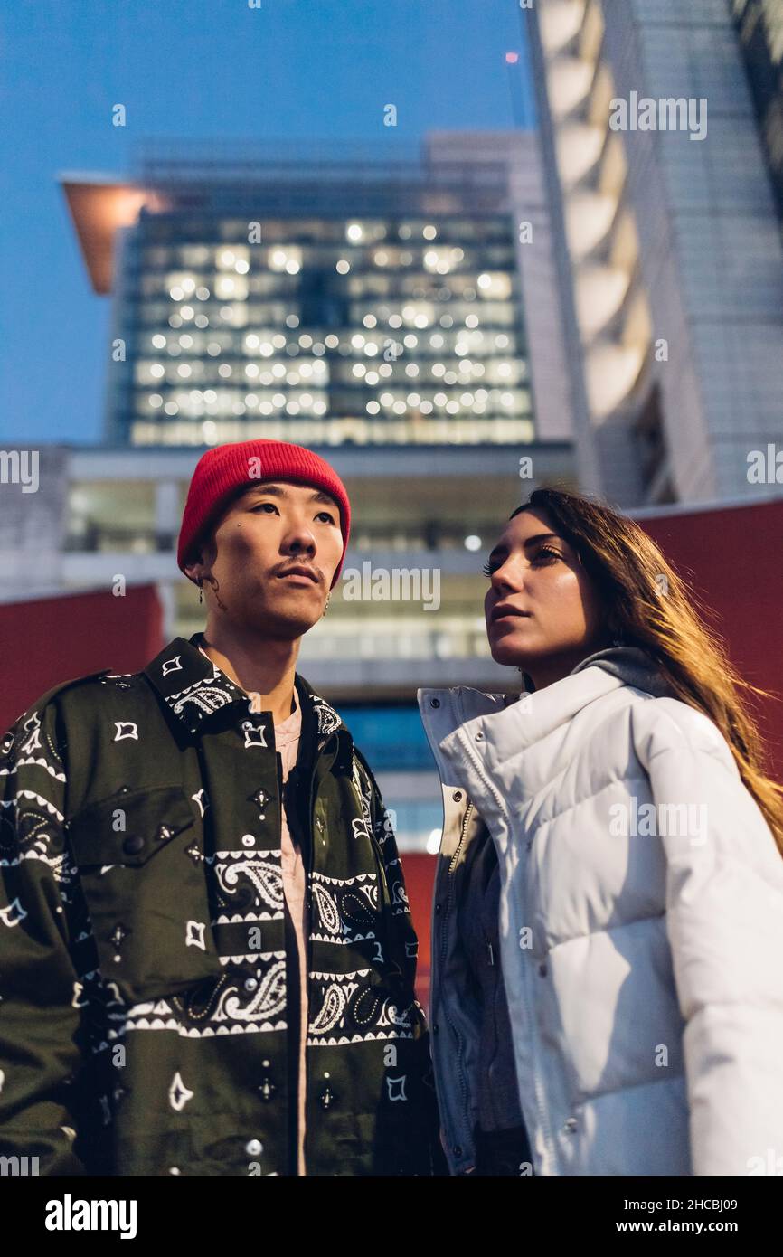 Asian couple standing near city hi-res stock photography and images - Alamy