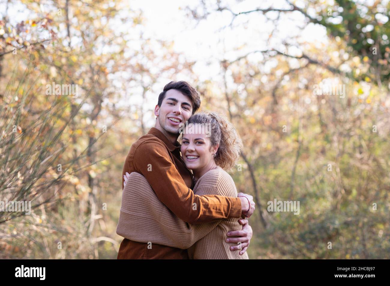 Male friends hugging other on hi-res stock photography and images - Alamy