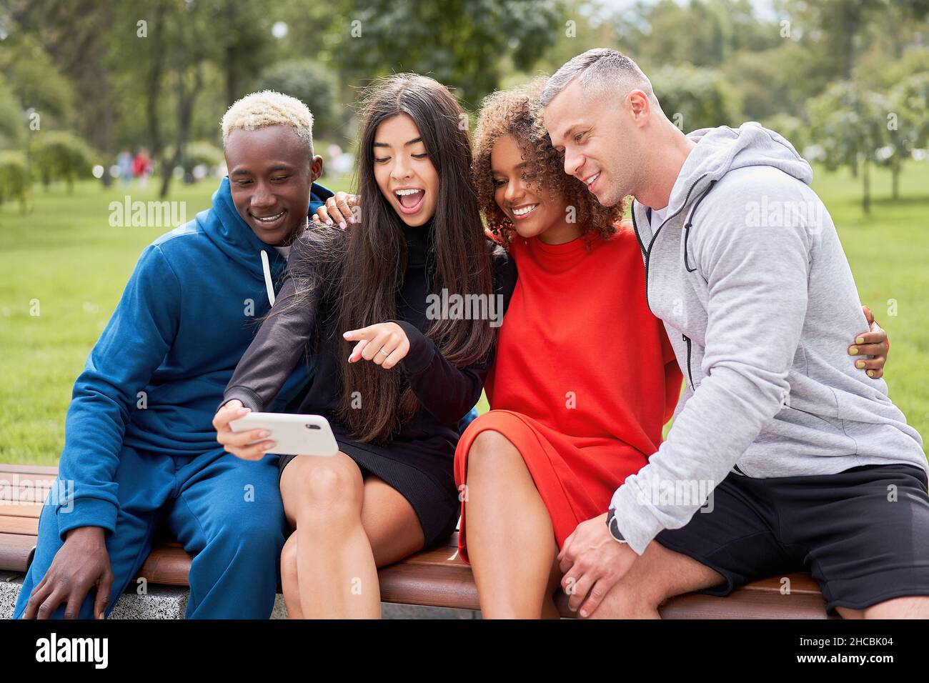 Multi ethnic friends outdoor taking a selfie on smartphone. Diverse ...