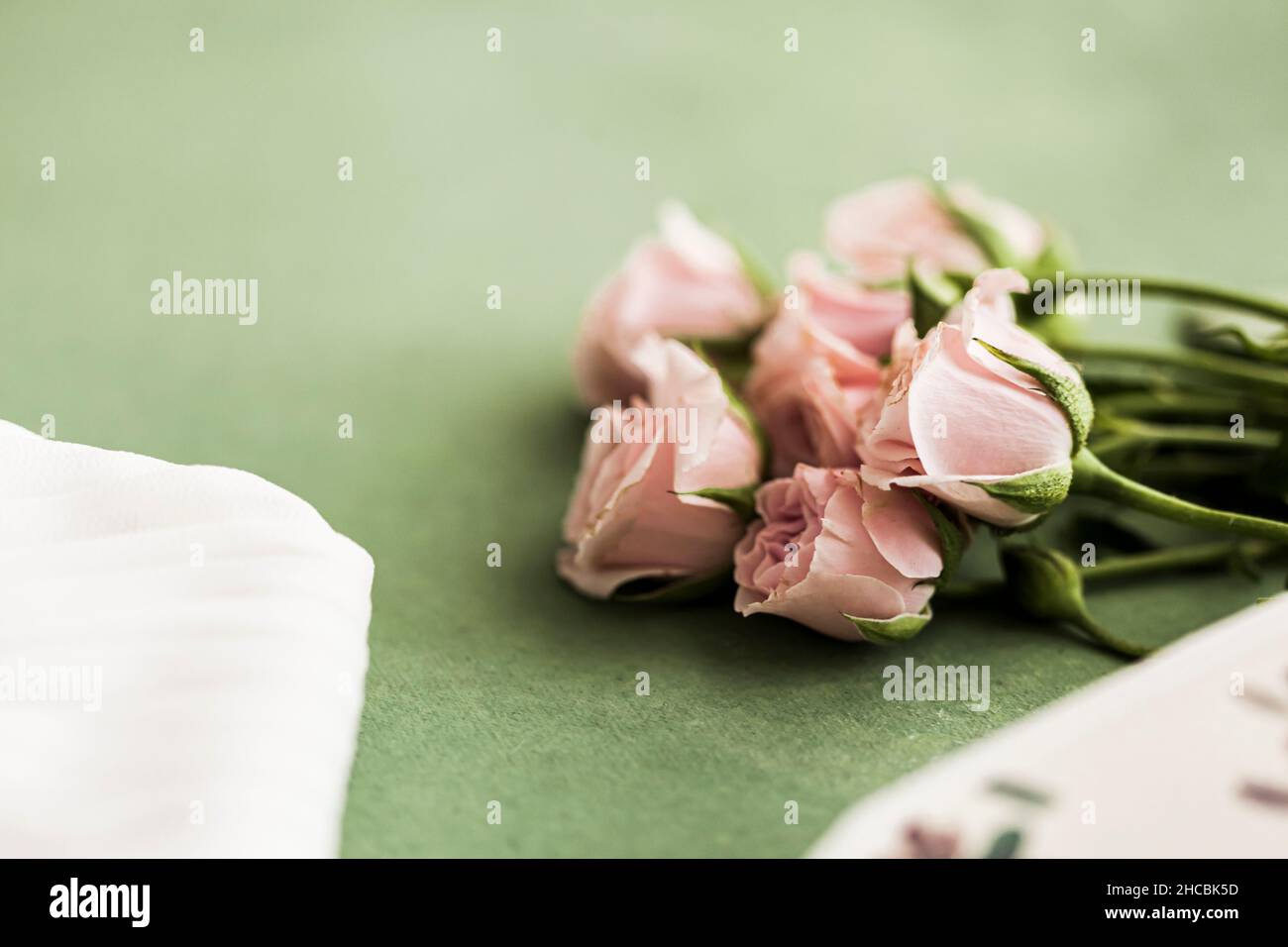 Studio shot of formal men's shoes, bow tie and pair of wedding rings Stock Photo