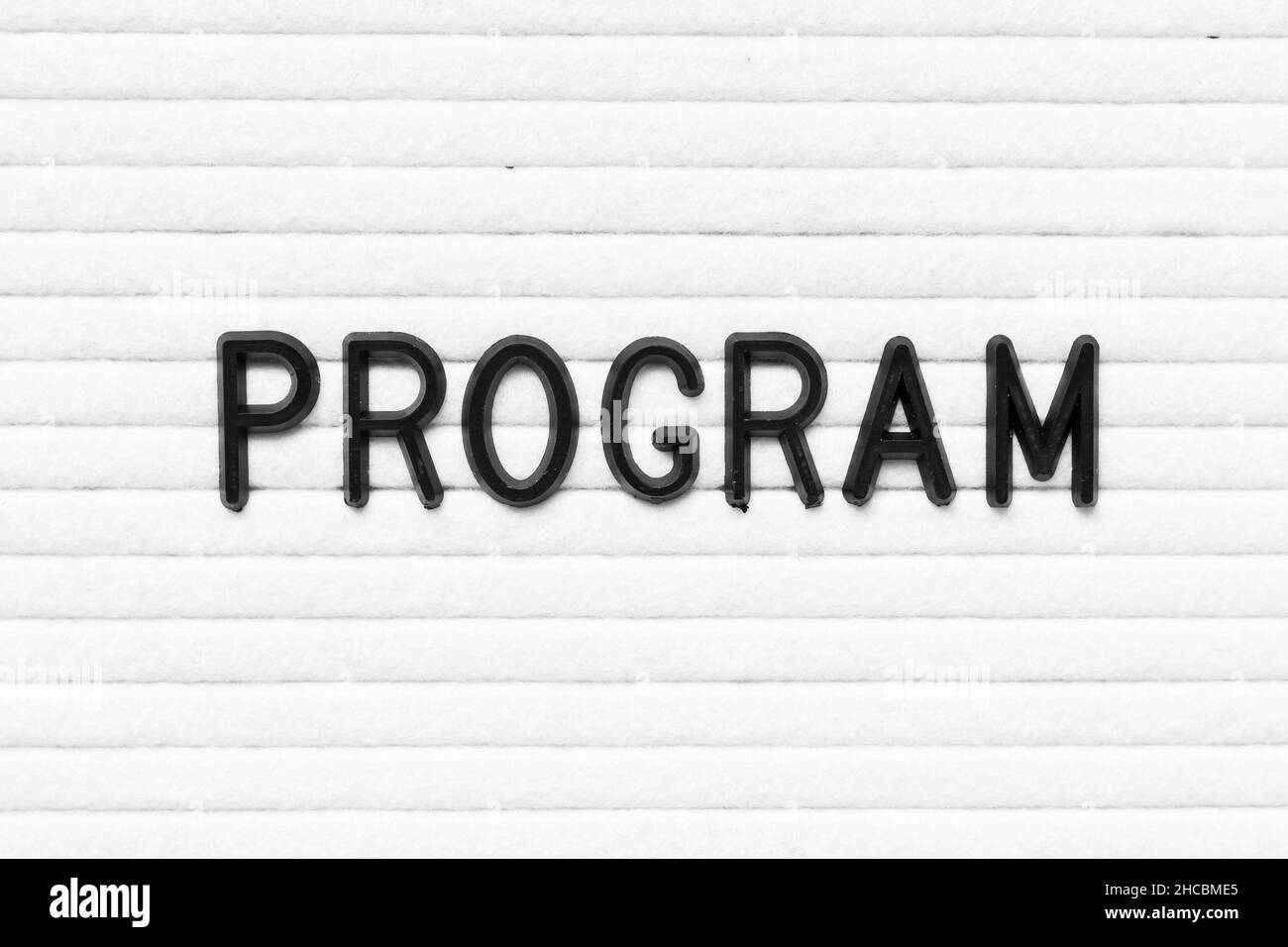 Black letter in word program on white felt board background Stock Photo ...