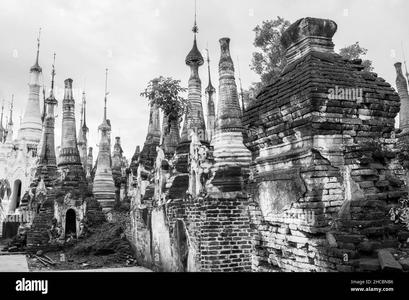 Ruins and remains of ancient Buddhist pagodas and stupas at Indein Village at Inle Lake Myamar Stock Photo