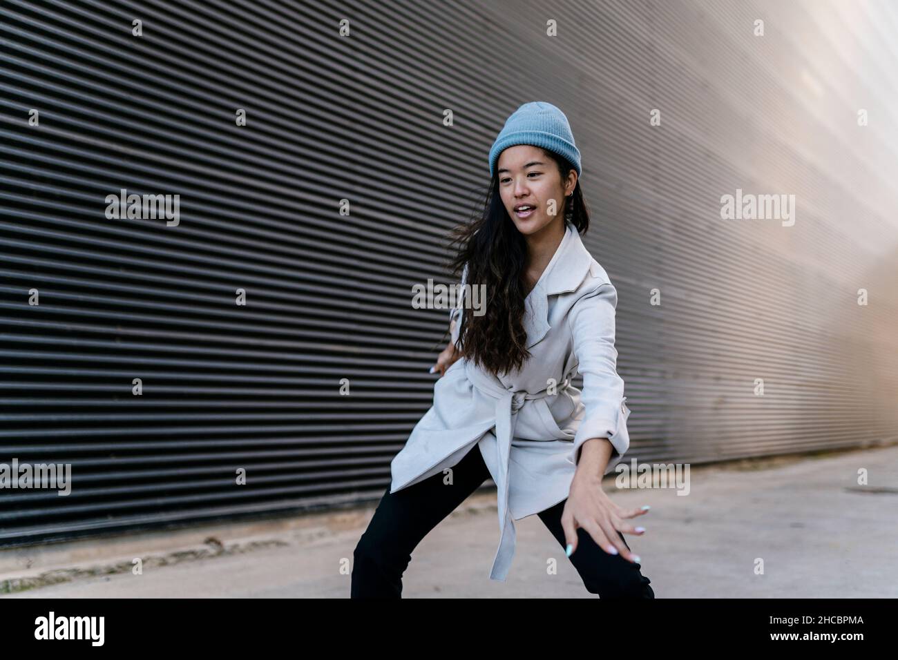 Asian young woman dancing hi-res stock photography and images - Alamy