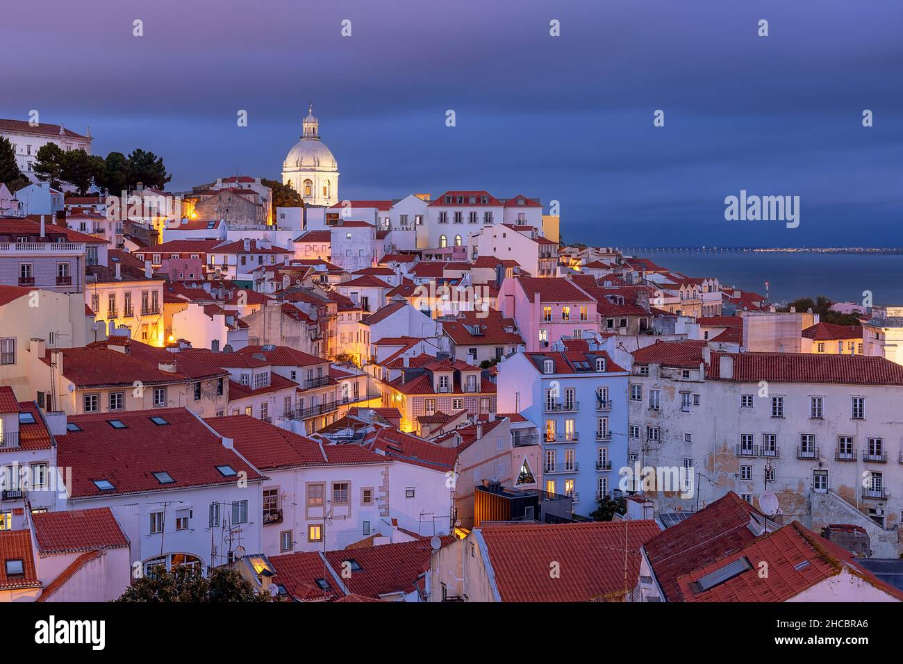 Lisbon is the beautiful capital of Portugal. Here we see the old alfama district from a popular viewpoint. Stock Photo