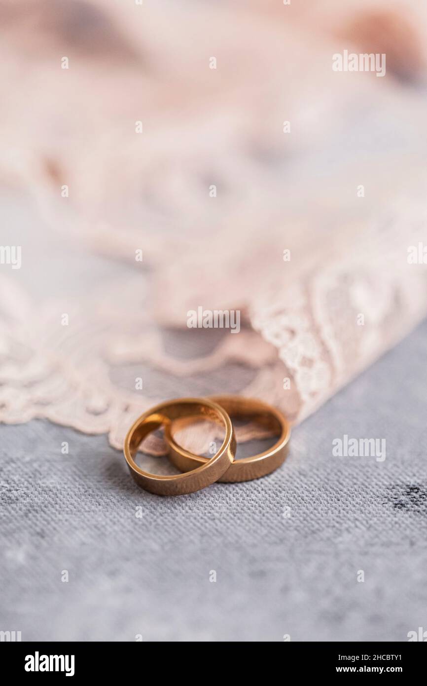 Studio shot of pair of golden wedding rings Stock Photo
