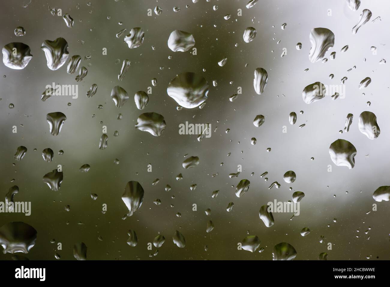 Raindrops on a Window -  Background Stock Photo