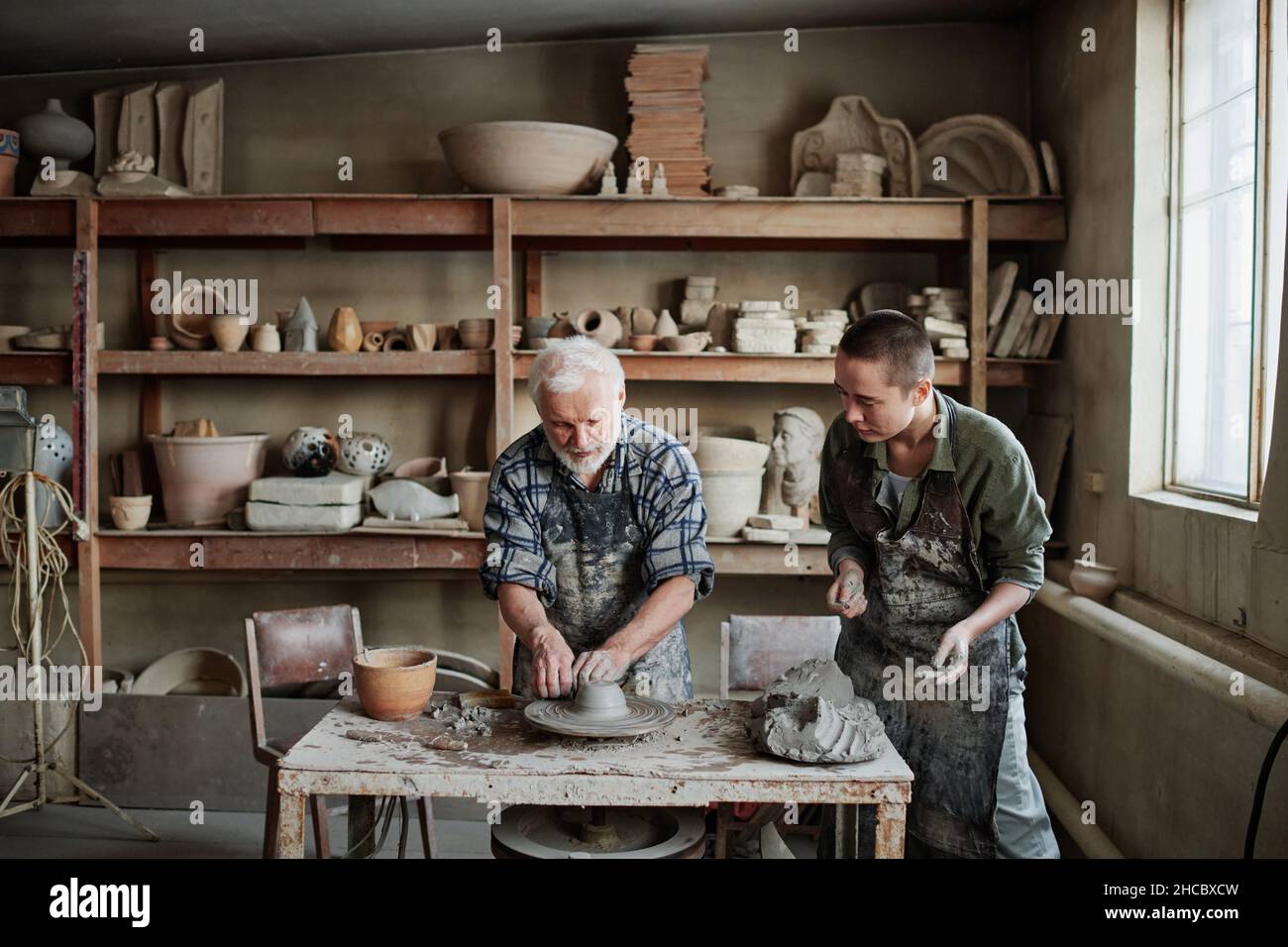 Mature adult woman pottery studio hi-res stock photography and images ...