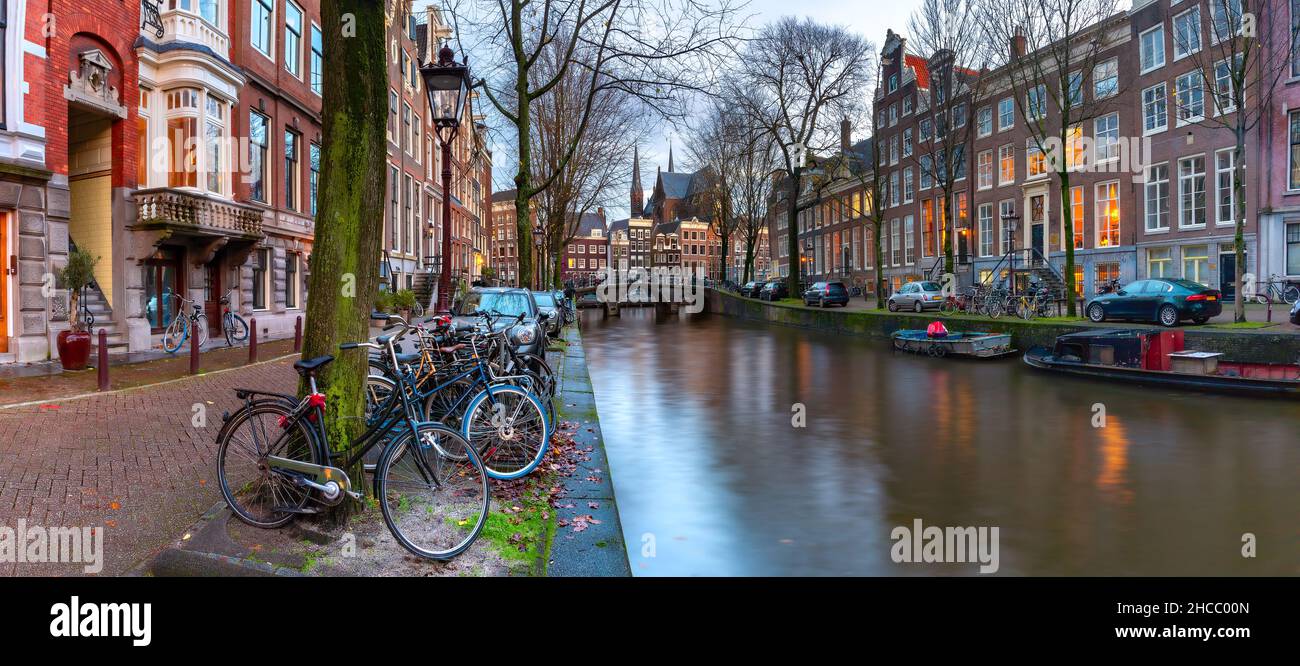 Panorama of Amsterdam canal Leidsegracht with typical dutch houses and bridge, Holland, Netherlands Stock Photo