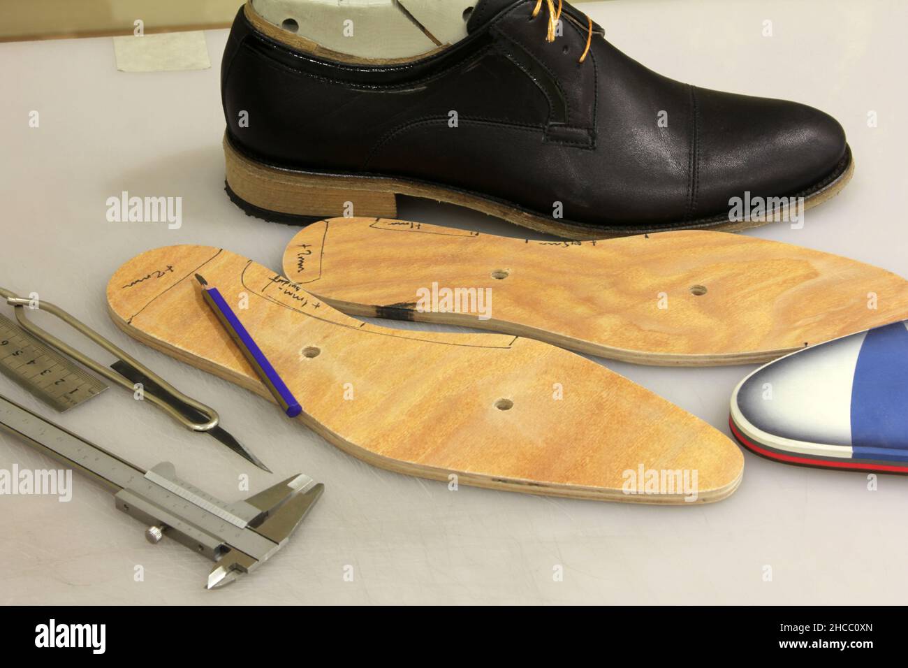 Manufacture of new shoes. Shoemaker's shop. Stock Photo