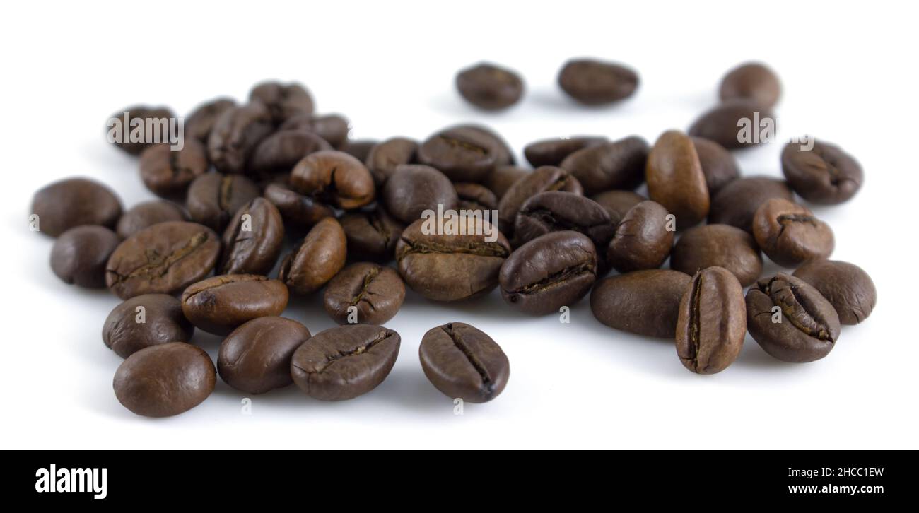 Coffee beans on a white background. Whole roasted arabica grains Stock ...