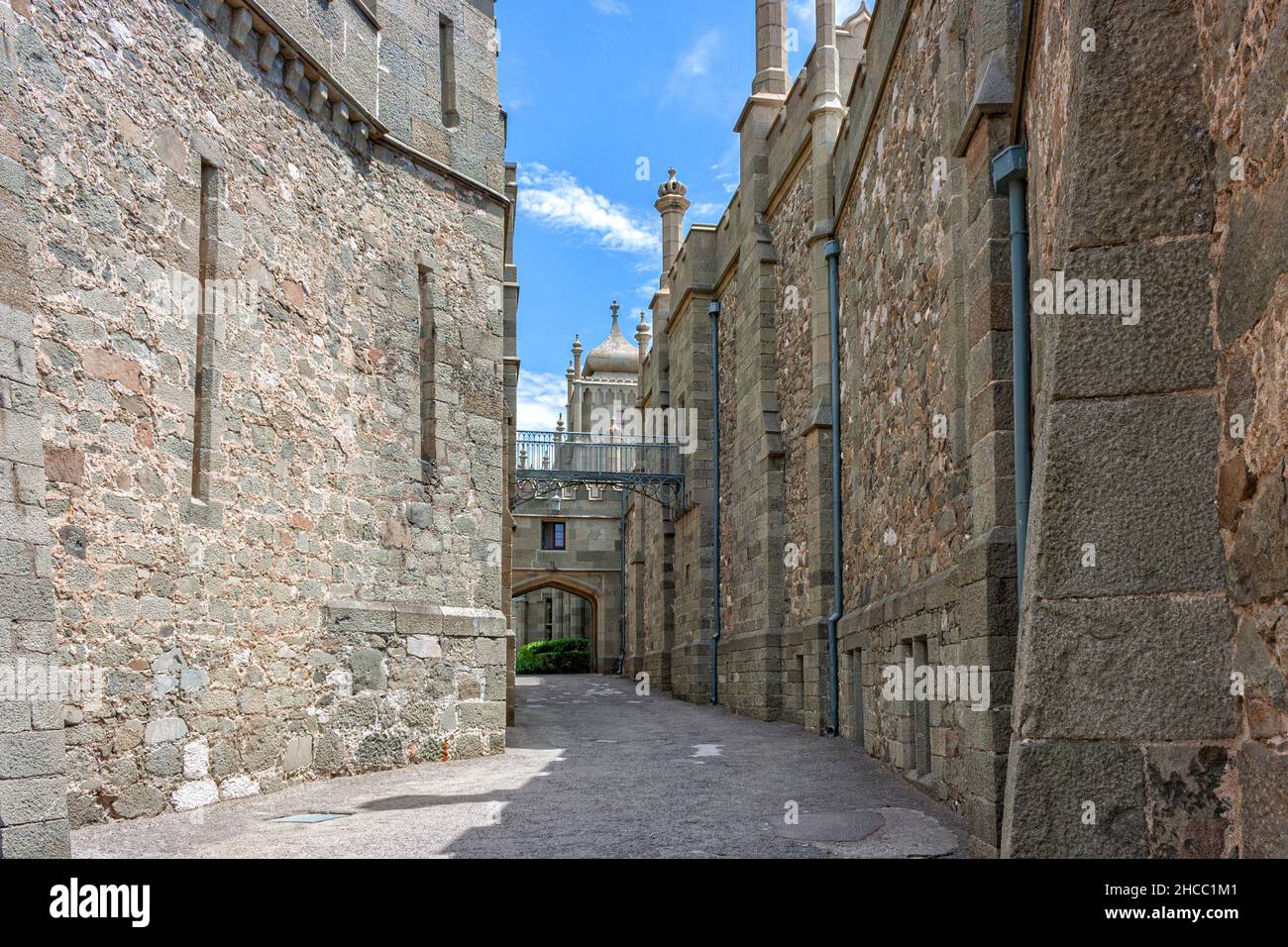 The inner narrow passage along the Shuvalov building in the Vorontsov Castle in the Crimea Stock Photo