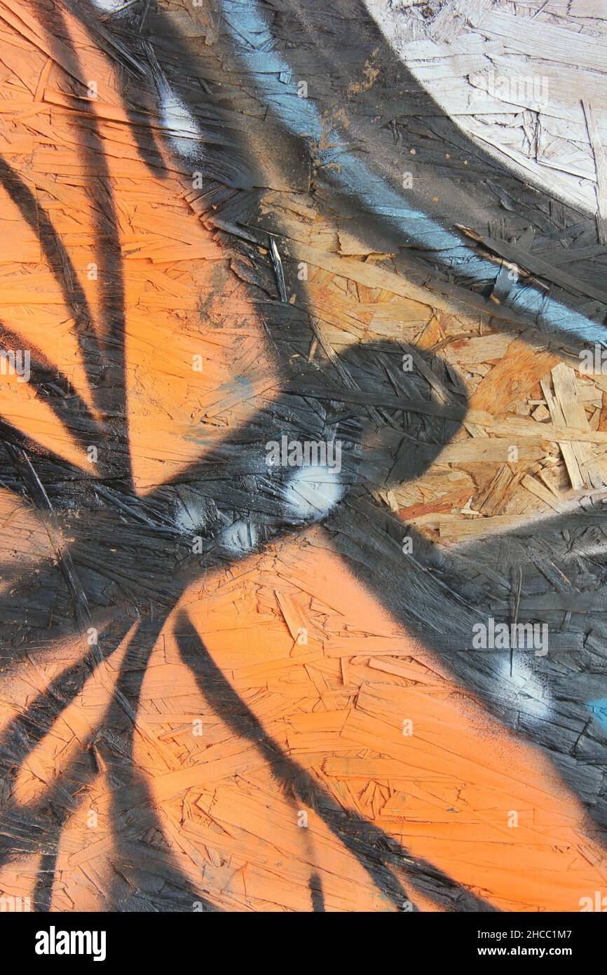Hand painted graffiti with black and blue spray paint Stock Photo Alamy