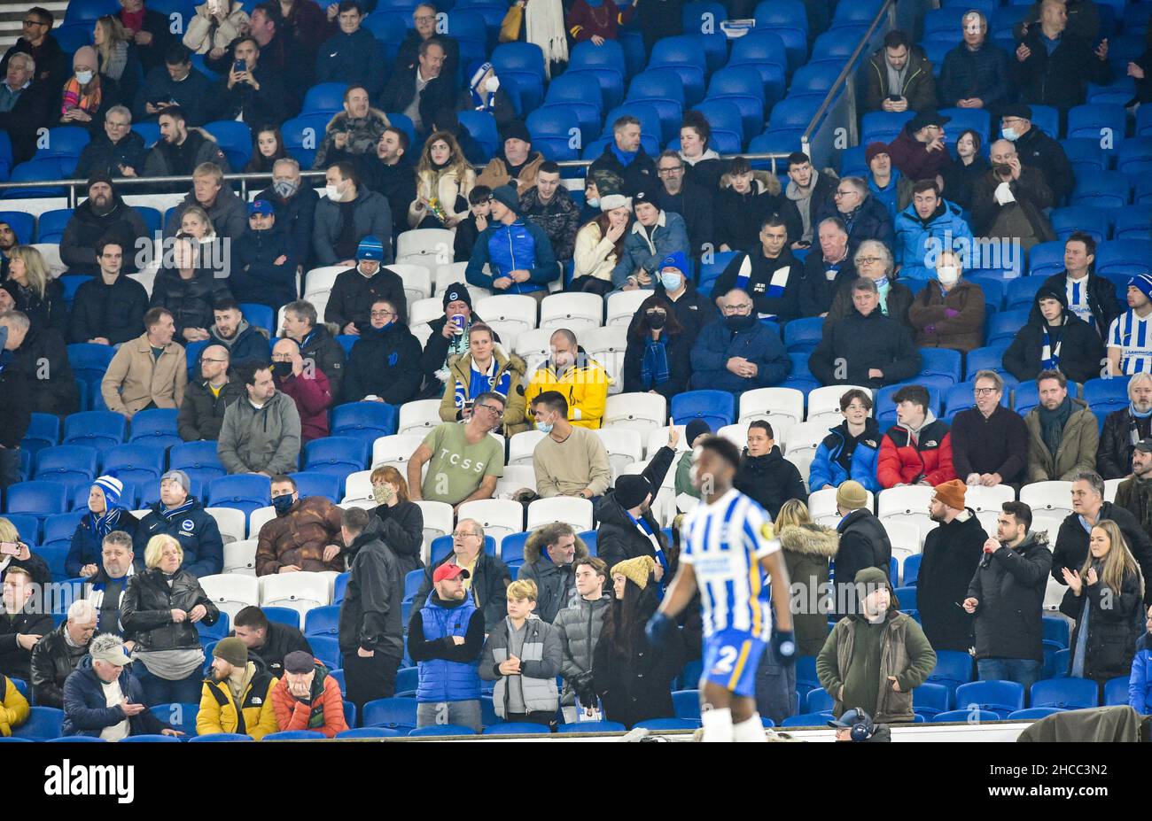 There were plenty of empty seats due to the kick off time of 8pm and Covid-19  during the Premier League match between Brighton and Hove Albion and Brentford at The American Express Community Stadium  , Brighton,  UK - 26th December 2021 - Editorial use only. No merchandising. For Football images FA and Premier League restrictions apply inc. no internet/mobile usage without FAPL license - for details contact Football Dataco Stock Photo
