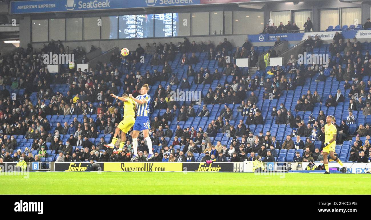 Plenty of empty seats during the Premier League match between Brighton and Hove Albion and Brentford at The American Express Community Stadium  , Brighton,  UK - 26th December 2021 - Photo Simon Dack/Telephoto Images Editorial use only. No merchandising. For Football images FA and Premier League restrictions apply inc. no internet/mobile usage without FAPL license - for details contact Football Dataco Stock Photo
