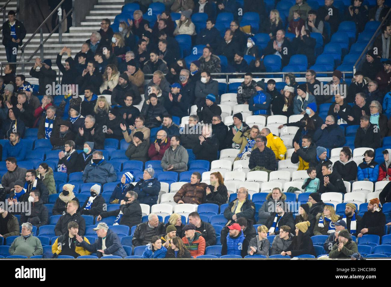 Empty seats during the Premier League match between Brighton and Hove Albion and Brentford at The American Express Community Stadium  , Brighton,  UK - 26th December 2021 -  Photo Simon Dack/Telephoto Images. Editorial use only. No merchandising. For Football images FA and Premier League restrictions apply inc. no internet/mobile usage without FAPL license - for details contact Football Dataco Stock Photo
