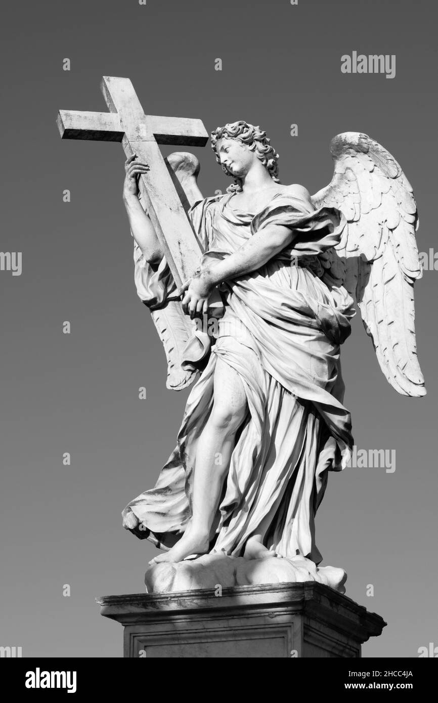 ROME, ITALY - SEPTEMBER 1, 2021: Statue of angel with the Cross in baroque style  from Angel's Bridge by Ercole Ferrata (1610 - 1686). Stock Photo