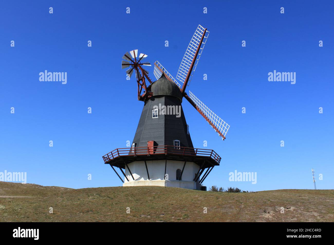 Old windmill during summer in Danmark Stock Photo