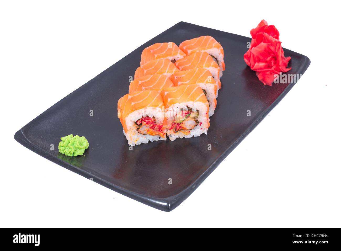 Japanese Cuisine - Sushi Roll with Shrimps and Conger, Avocado, Tobiko and Cheese. sushi rolls tempura,japanese food style Stock Photo