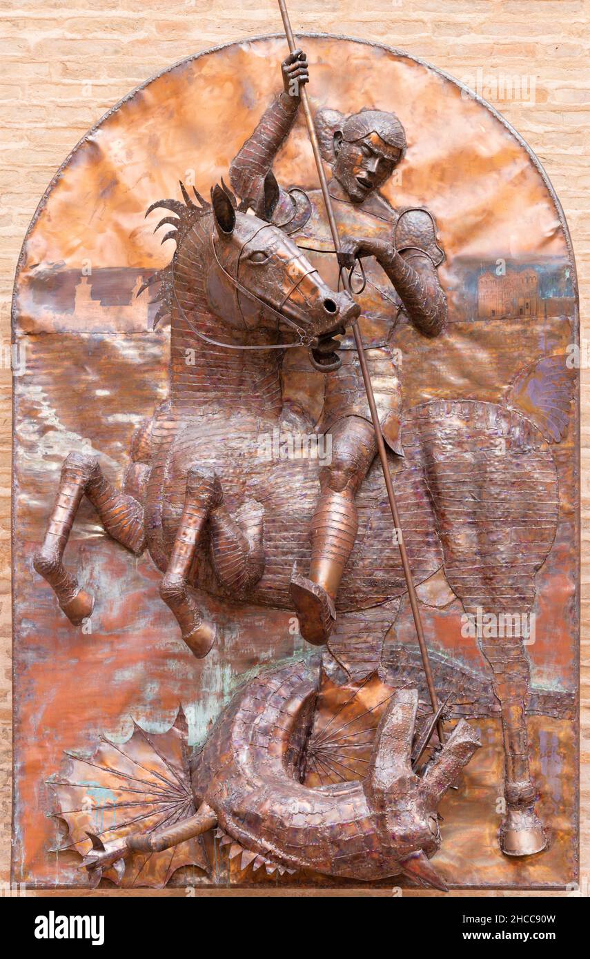 Ferrara - The copper relief of Saint George with the dragon in the atrium of Castello Estense by Sara Bolzani e Nicola Zamboni Stock Photo