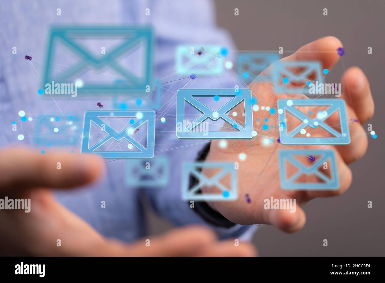 Closeup of the hands holding the floating email icons Stock Photo - Alamy