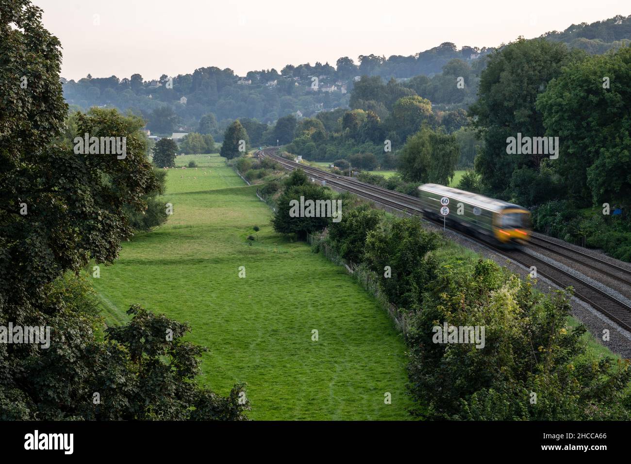 A GWR passenger train passes through the Avon Valley at Freshford near Bath. Stock Photo
