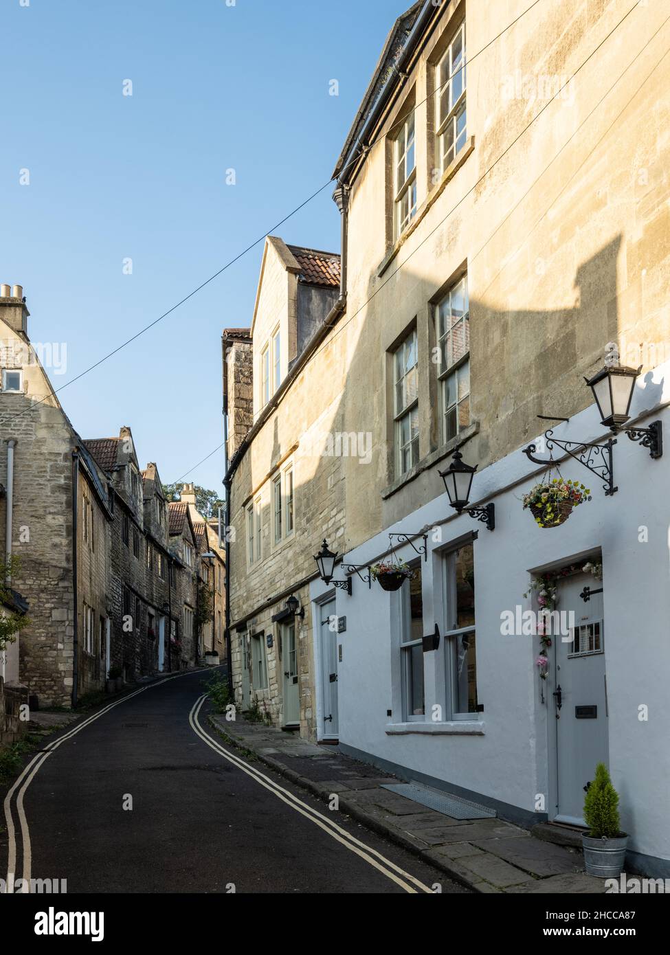 Traditional stone cottages line the narrow street of Coppice Hill in
