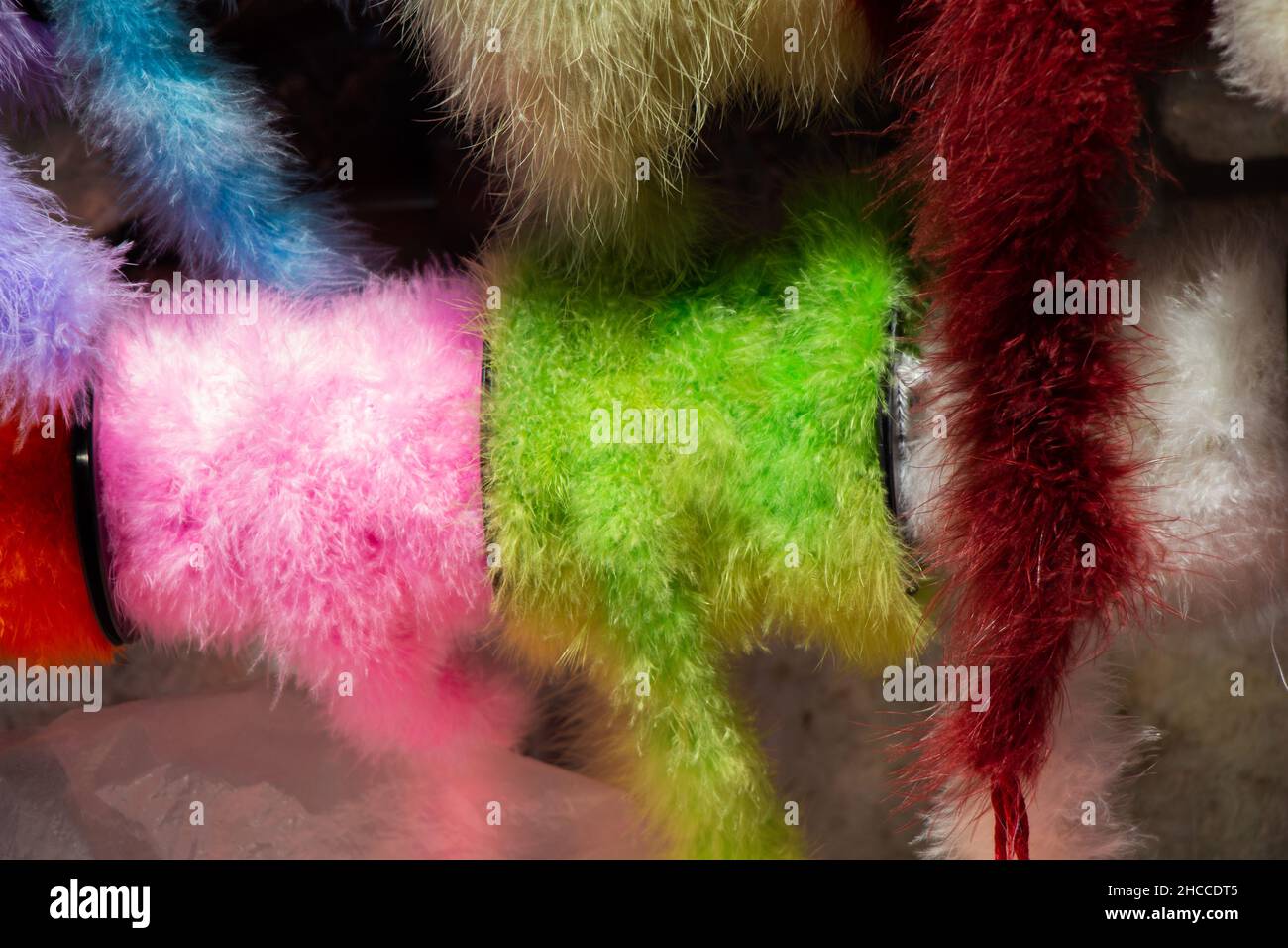 Colorful feather boas in a thread shop Stock Photo